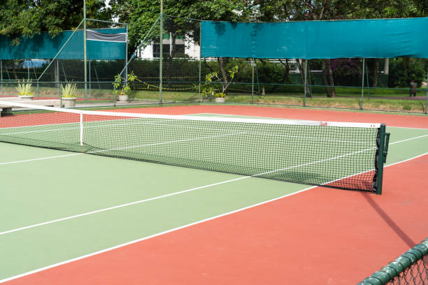 C’est quoi le meilleur moment pour entreprendre une rénovation d’un court de tennis en béton poreux à Paris ?